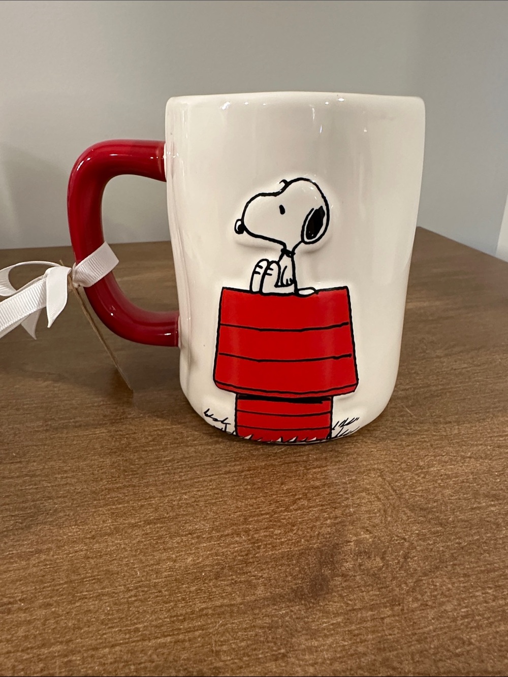 Rae Dunn White Ceramic Mug with Red Handle and Snoopy Graphic
